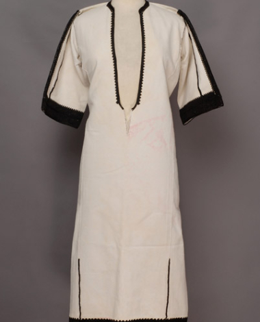 Cotton woven chemise, embroidered at the border with black woollen threads