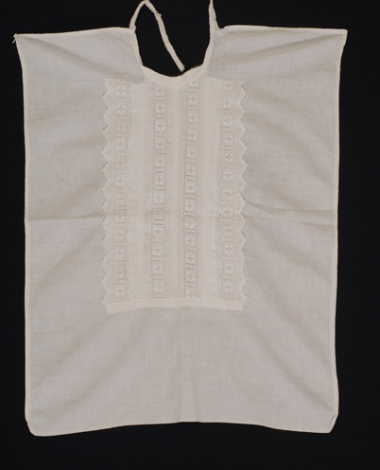 Plastron made of calico, ornamented with applique white embroidery