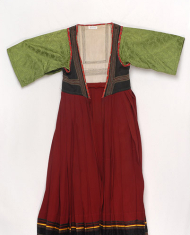 Foustani (dress) made of crimson woollen fabric, ornamented with karelisia embroideries (multicoloured stitches)