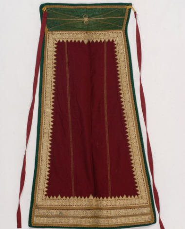 Karagounian apron made of crimson felt. Decoration with gold cordons. 