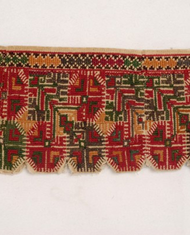 Part of the handwoven, cotton chemise border, embroidered with colourful silk threads