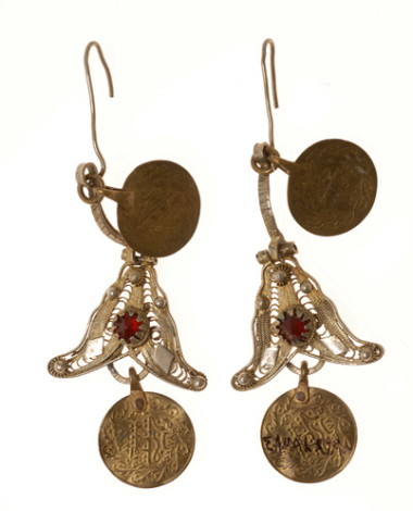 Pair of wiry gold plated earrings ornamented with red glass stone and gilded coins