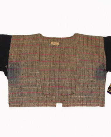 Katasarki, woollen woven flannel with dark blue sleeves ornamented with multicoloured geometrical motifs 