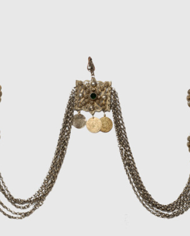 Kefalokobtsa, chained head ornament with wiry rosettes, ornamented with green glass stones