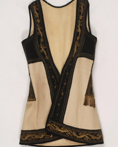 Whitish, felt sigouni, sleeveless overcoat embellished with applique gold embroidered pieces of black felt