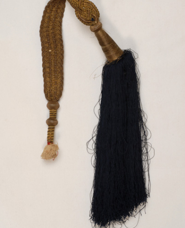 Papazi, long knitted and ornate tarboosh cord that ends in a long tassel