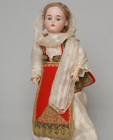 Porcelain doll, in the women's costume of Arachova, from the doll's collection of Queen Olga 