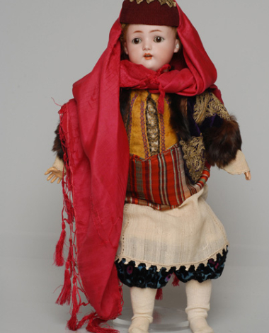 Porcelain doll, in the festive women's costume of Kastelorizo, from the doll's collection of Queen Olga 