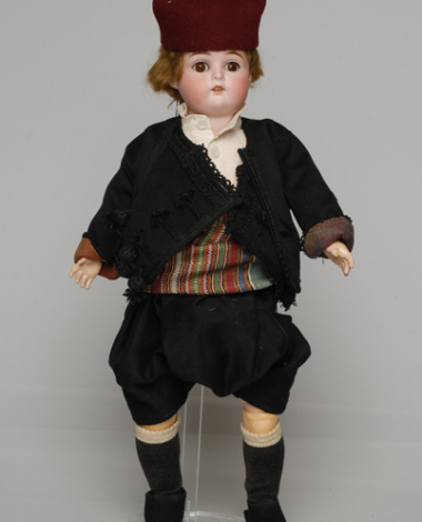 Porcelain doll, in the men's festive costume of Kastelorizo, from the doll's collection of Queen Olga 