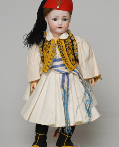Porcelain doll from the Queen Olga collection in the costume of a male foustanella wearer from Patras