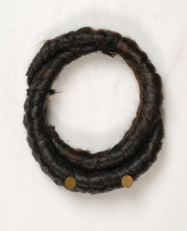Perouklia or the kosidia, double thick braid (kosa) in ring shape. Head dress accessory of old type from Metsovo 