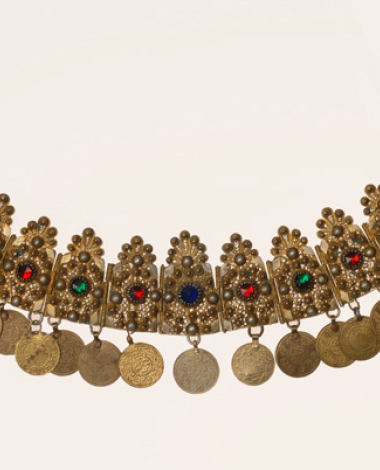 Gilt xelitsi, filigree head ornament decorated with variegated glass stones