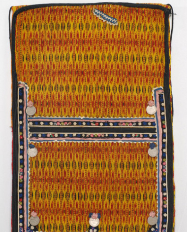 Woollen woven apron in yellow colour, with embellished vertical stripes with stylized motifs in red and black colour