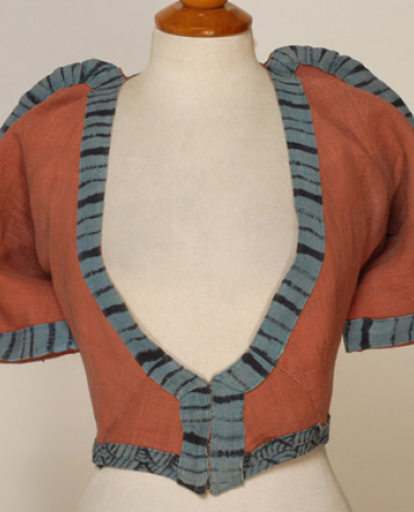 Short sleeved jacket from the costume of a Priestess
