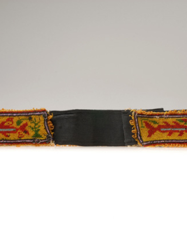 Bead-knitted belt made secure with cotton woven fabric