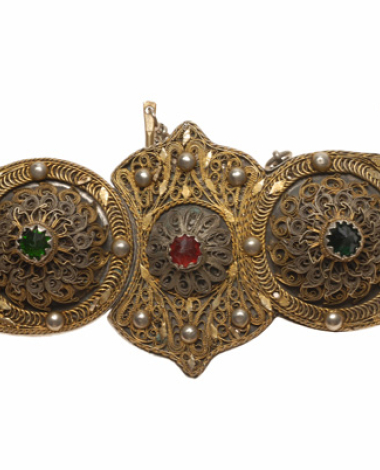 Gilded buckle with wiry multi-leafed rosettes and coloured glass stones 