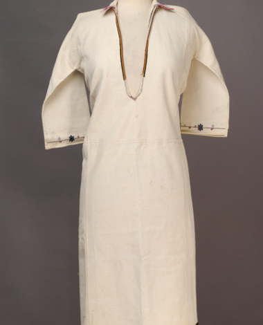 White cotton woven chemise, embroidered with woollen and silk coloured coloured threads