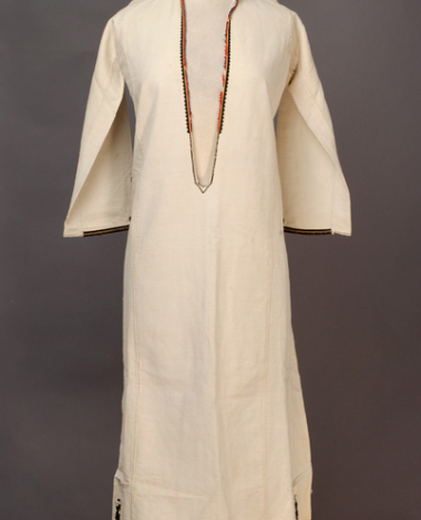 White cotton woven chemise, embroidered with coloured woollen threads