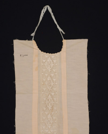 Plastron, pectoral piece of fabric trimmed with lace sold by the metre