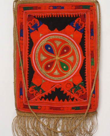 Tagari made of black cloth (felt) ornamented with embroideries of the typical outradhenies karagounian costumes. Front, decoration with silk coloured outradhes and gold cordon with the round, the dougadakia, the hunter and the sarakatsana 
