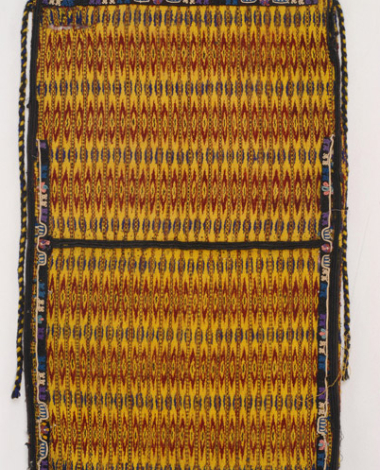 Woollen woven apron in yellow colour, with embellished vertical stripes with stylized motifs in red and purple colour