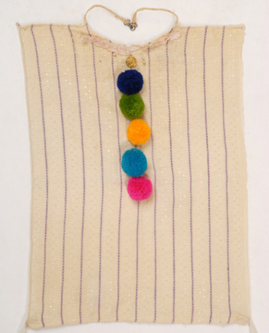 Plastron, pectoral accessory of women's costume from Alona, ornamented with applique elements, coloured woollen small tassels (pon-pon), ribbon sold by the metre, pearls