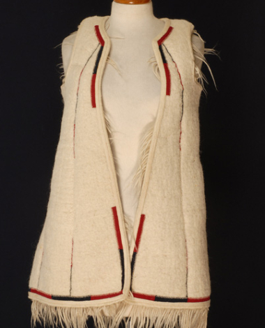 Woven sigouni from Megara, with embellished fringes at the inner side