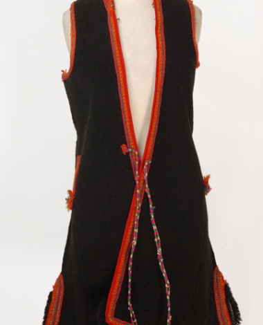 Woollen sigouna, sleeveless overcoat made of saddle blanket decorated with colourful seradia and silver cordons