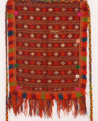 Woollen woven apron with embellished band shaped themes with linear and cross shaped motifs