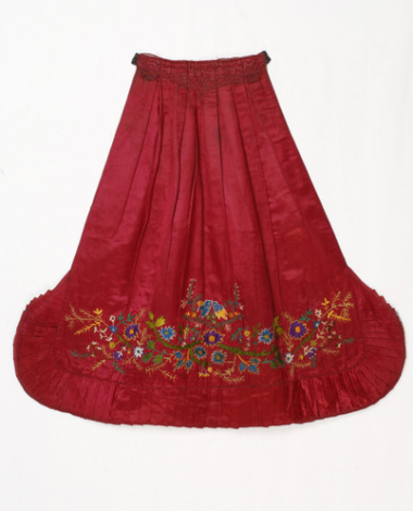 Red satin apron embroidered with multicoloured silk threads