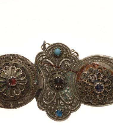 Silver forged buckle with wiry multi-leafed rosettes, coloured glass stones and turquoise 