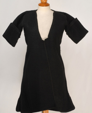 Kiourdia, inner sleeved overcoat made of black horse cloth, ornamented with plain-coloured cordons and loops