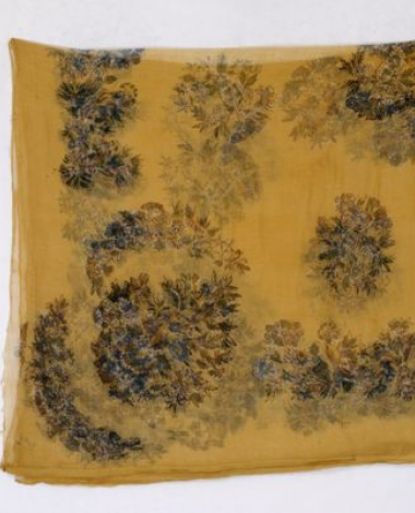 Yellow printed head kerchief with leafy scrolls and flowers