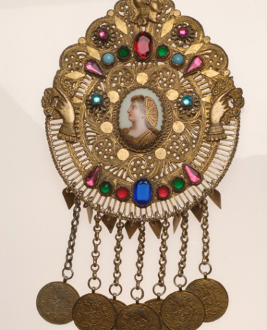 Tzakos pin, gilt filigree pin decorated with colourful glass stones, turquoise, miniature, gilded coin imitations and the head of Goddess Athina on top