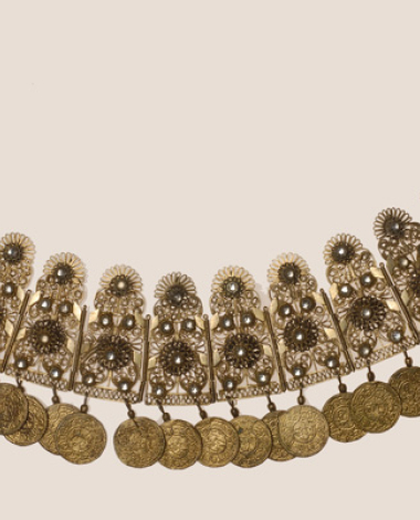 Gilt xelitsi, crafted filigree head ornament decorated with transparent glass stones and gilded coins