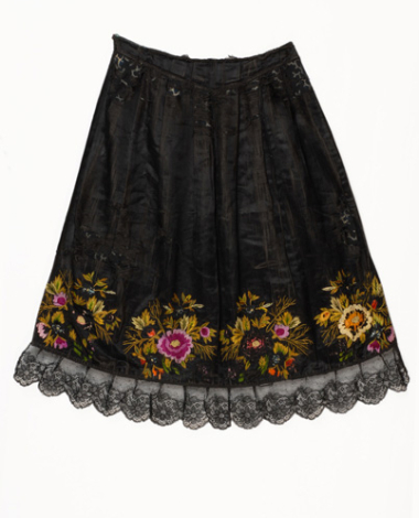 Black satin apron embroidered with multicoloured silk threads