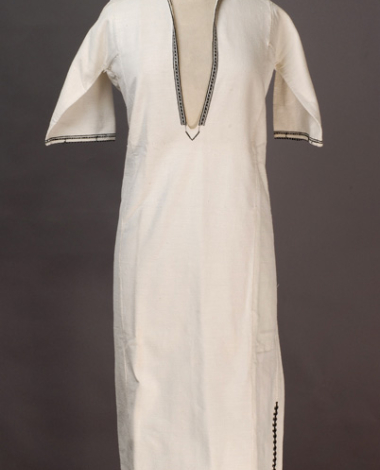 White cotton woven chemise, ornamented with white and black embroideries