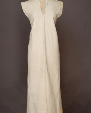 Poukamisa me tis podies, long outer cotton garment with large openings at the right and the left sides