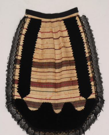 Spathoti woven apron with embellished horizontal stripes. Applique decoration with pieces of velvet and black lace